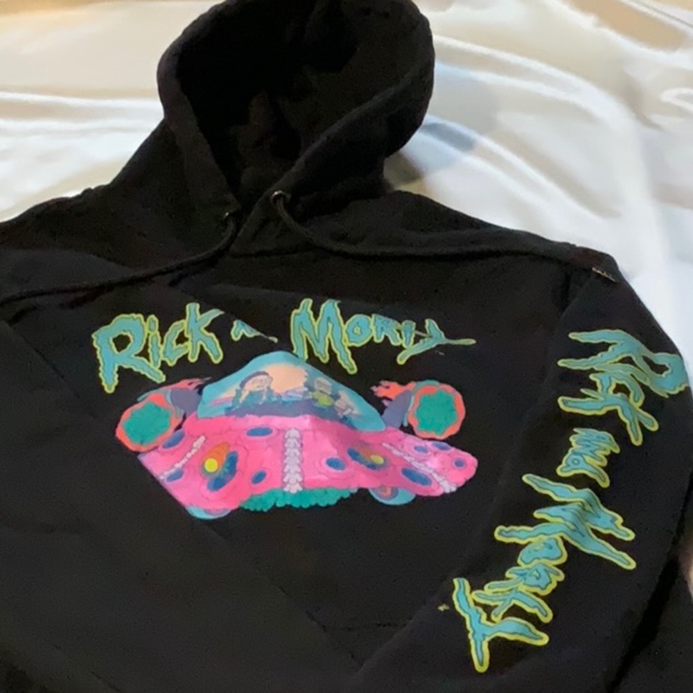 Rick and Morty brand hoodie, size Large in black. This hoodie is unisex.
